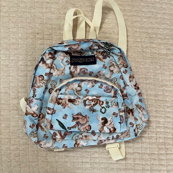 JanSport Half Pint Blue Cherub Print Backpack - Picture 2 of 3